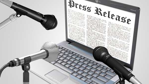 Image of Press Release Microphones and a Computer screen